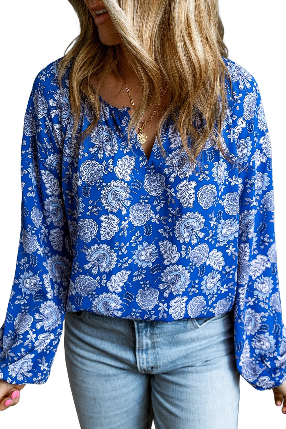 Floral Notched V-Neck Long Sleeve Blouse