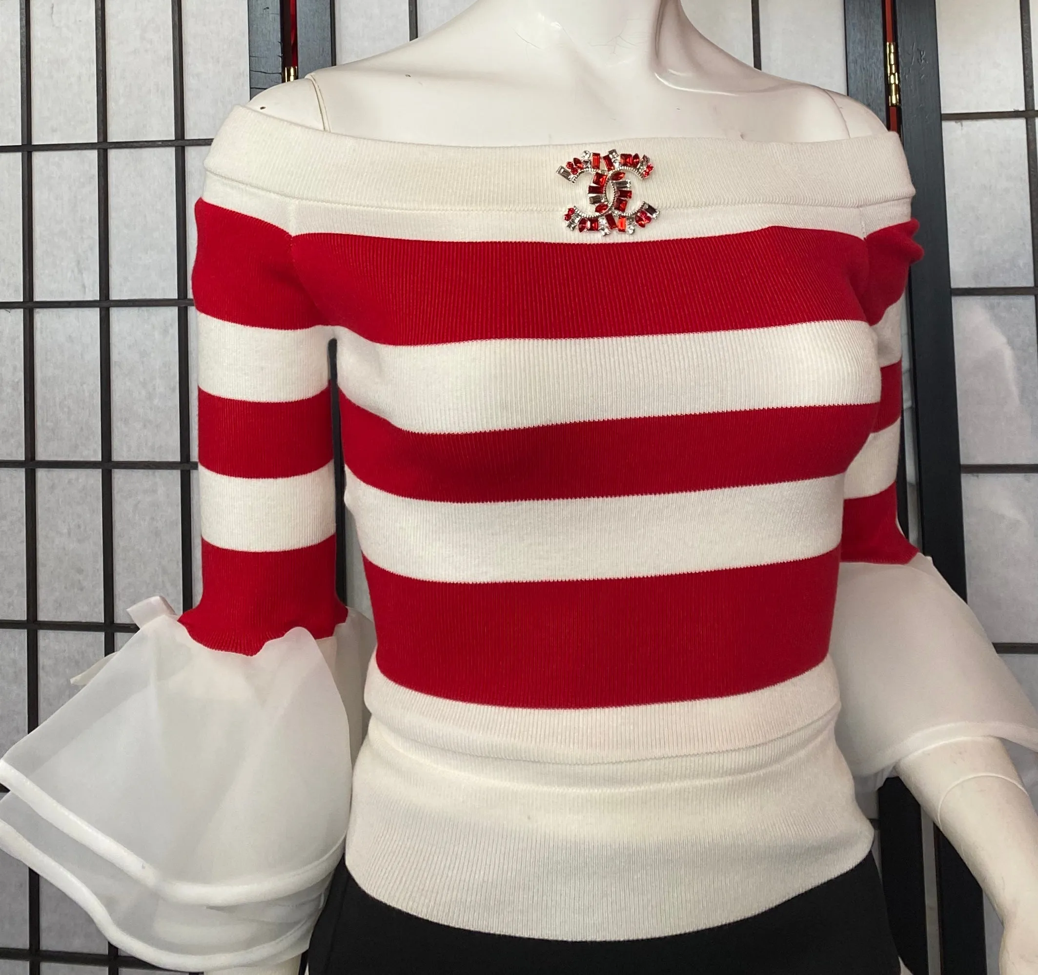 Red and white striped knit blouse